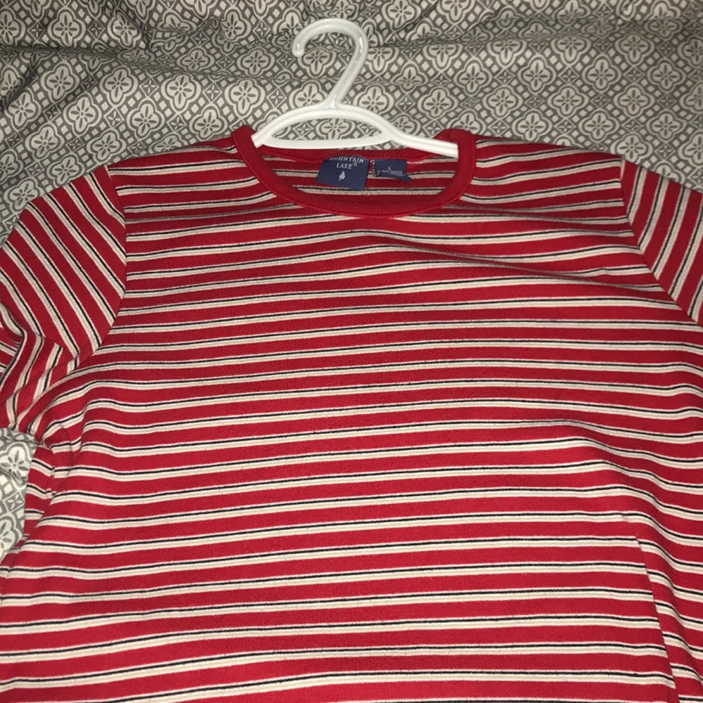 Red stripped shirt. Size large, fits a medium
